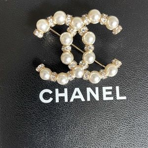 Chanel CC brooch